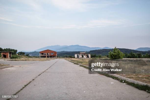 destroyed building with bullet holes. - bullet hole in wood stock pictures, royalty-free photos & images