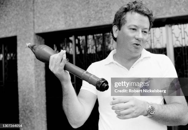 View of US Embassy Public Affairs Officer Don Hamilton as he holds a rocket propelled grenade , at the US Embassy in San Salvador, El Salvador, March...