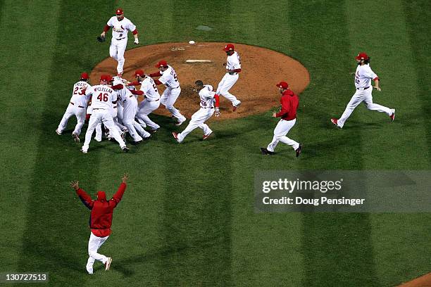 The St. Louis Cardinals celebrate after defeating the Texas Rangers 6-2 to win the World Series in Game Seven of the MLB World Series at Busch...