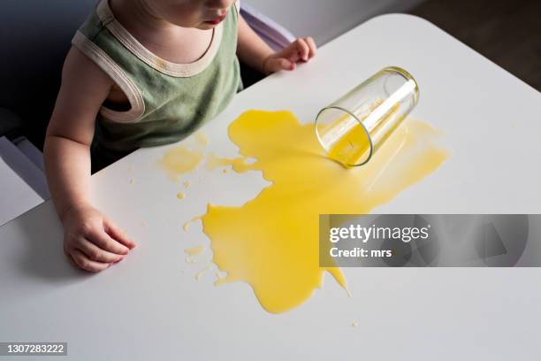spilled juice - spilled drink stock pictures, royalty-free photos & images
