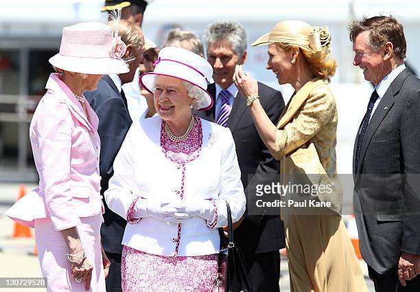 Queen Elizabeth II is farewelled by the Govenor-General of Australia Quentin Bryce, Minister for Defence Stephen Smith, Tonya McCusker and Governor...