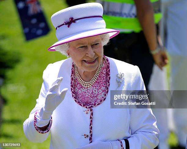 Queen Elizabeth II waves to well-wishers on the final day of her Australian tour at the Great Aussie BBQ on October 29, 2011 in Perth, Australia. The...