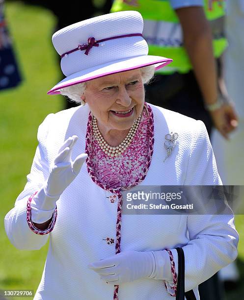 Queen Elizabeth II waves to well-wishers on the final day of her Australian tour at the Great Aussie BBQ on October 29, 2011 in Perth, Australia. The...