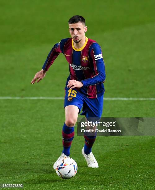 Clement Lenglet of FC Barcelona runs with the ball during the La Liga Santander match between FC Barcelona and SD Huesca at Camp Nou on March 15,...