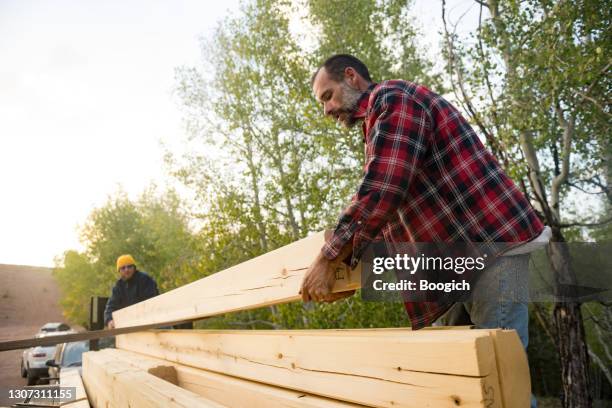 Log Man Carry Log Photos and Premium High Res Pictures - Getty Images