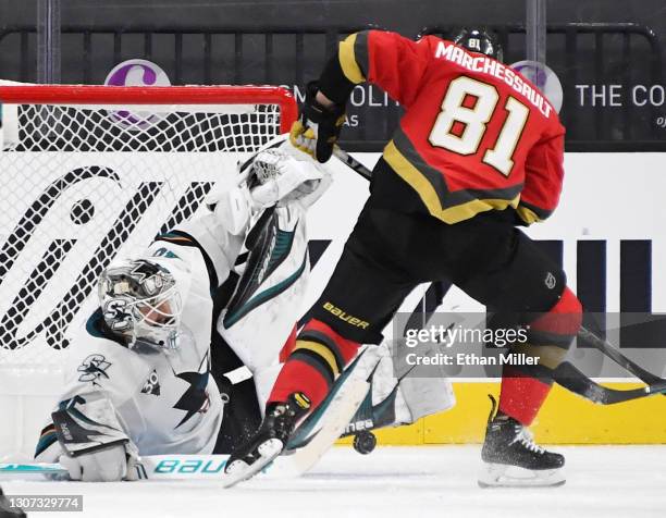 Devan Dubnyk of the San Jose Sharks makes a save against Jonathan Marchessault of the Vegas Golden Knights in the third period of their game at...