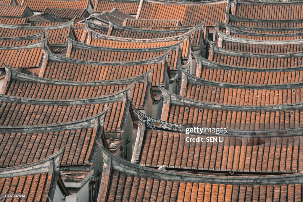 Aerial view of rooftop of the ancient Chinese village buildings, an traditional village with neat rows of houses in Zhangzhou, Fujian, China