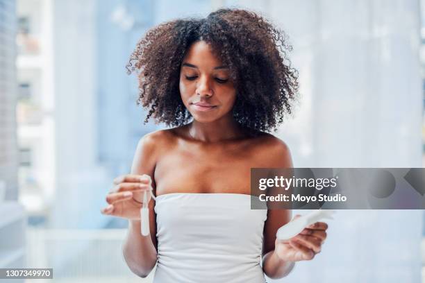 which one offers better protection? - women in a tampon stock pictures, royalty-free photos & images