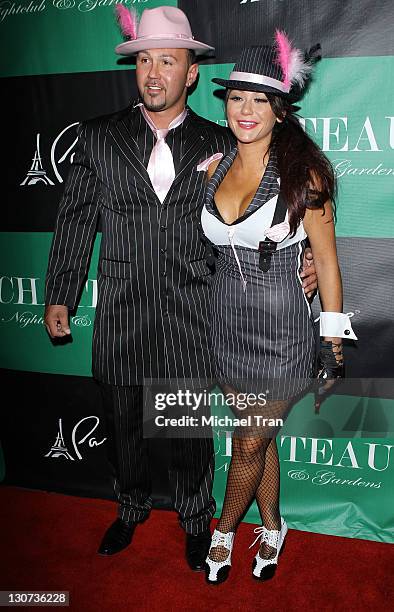 Roger Mathews and Jenni "JWoww" Farley arrive at the "Pimp N Ho" costume ball held at Chateau Nightclub & Gardens on October 28, 2011 in Las Vegas,...
