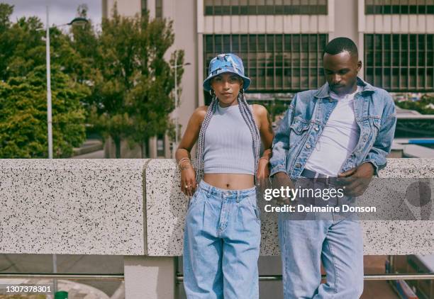 they call us fashion icons around here - boyfriend jeans stock pictures, royalty-free photos & images