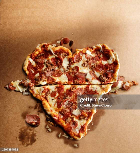 heart attack pizza - heart shape pizza stock pictures, royalty-free photos & images