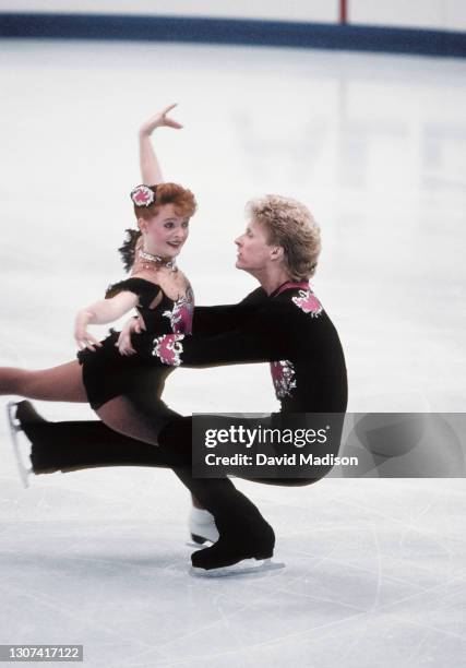 Jenni Meno and Scott Wendland of the USA compete in the Pairs Free Skate event in the Figure Skating competition of the 1992 Winter Olympic Games on...