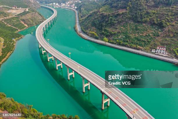 Aerial view of the Guzhao Highway, which is about 11km long and built in the middle of a river valley, on March 15, 2021 in Xingshan County, Hubei...