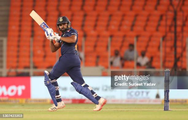Rohit Sharma of India hits runs during the 3rd T20 International between India and England at Narendra Modi Stadium on March 16, 2021 in Ahmedabad,...
