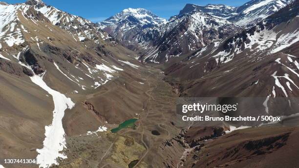 scenic view of snowcapped mountains against sky,aconcagua,mendoza,argentina - mount aconcagua stock pictures, royalty-free photos & images
