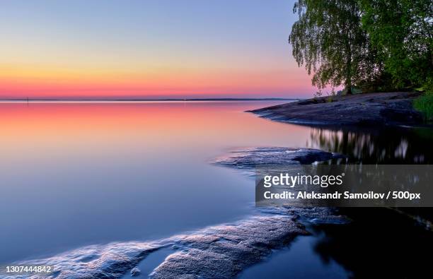 scenic view of sea against sky at sunset,tampere,finland - tampere finland stock-fotos und bilder