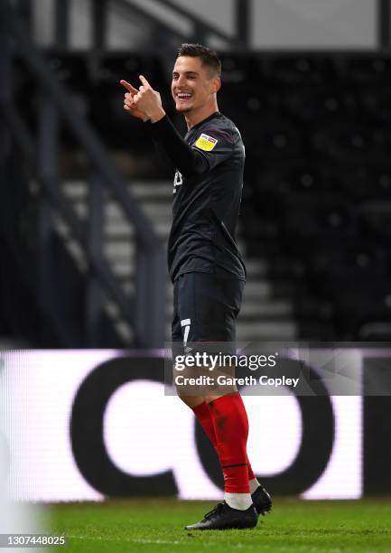 Sergi Canos of Brentford celebrates after scoring their side's second goal during the Sky Bet Championship match between Derby County and Brentford...