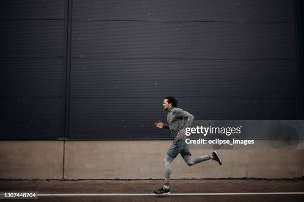 i will beat myself - man sprinting stock pictures, royalty-free photos & images