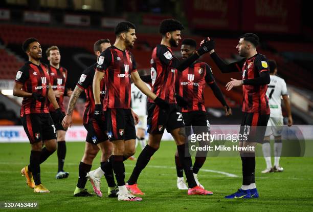 Philip Billing of AFC Bournemouth celebrates with team mate Diego Rico after scoring their side's first goal during the Sky Bet Championship match...