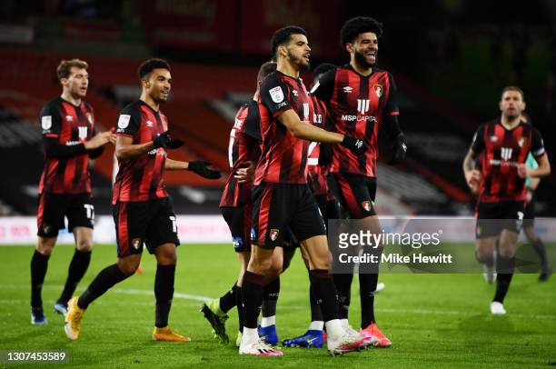 Philip Billing of AFC Bournemouth celebrates with team mate Dominic Solanke after scoring their side's first goal during the Sky Bet Championship...