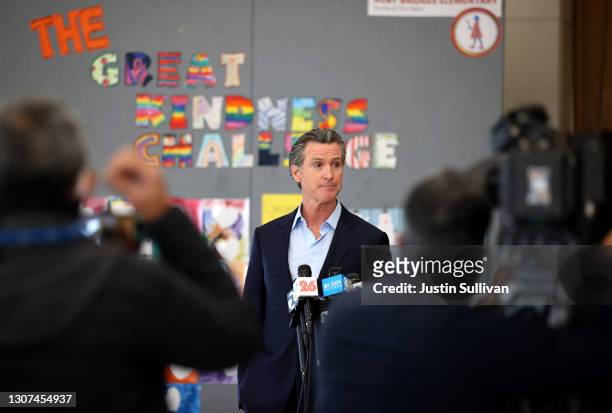 California Gov. Gavin Newsom speaks during a news conference after he toured the newly reopened Ruby Bridges Elementary School on March 16, 2021 in...