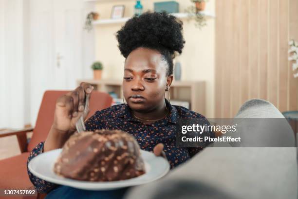 i can't get enough - stress eating stock pictures, royalty-free photos & images