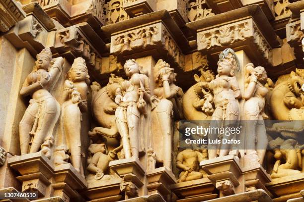 khajuraho, detail of surasundari statues with squirrel - khajuraho statues stock pictures, royalty-free photos & images