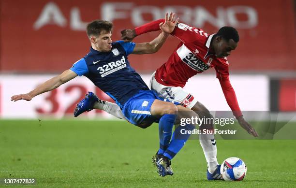 Preston player Jayson Molumby challenges Marc Bola of Middlesbrough during the Sky Bet Championship match between Middlesbrough and Preston North End...