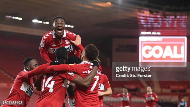 Marc Bola joins the celebrations after Marcus Tavernier of Middlesbrough had scored the second Boro goal during the Sky Bet Championship match...