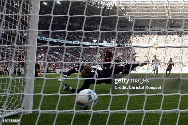 Ron-Robert Zieler of Hannover gets the first goal of Marco Reus of Moenchengladbach during the Bundesliga match between Borussia Moenchengladbach and...