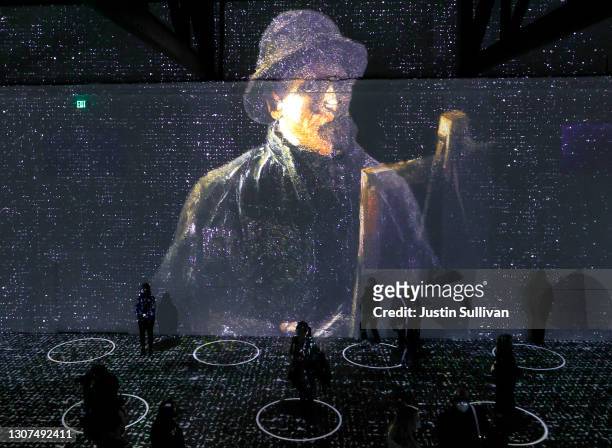 Guests view the Immersive Van Gogh Exhibit during a media preview at SVN West on March 16, 2021 in San Francisco, California. “Immersive van Gogh,”...