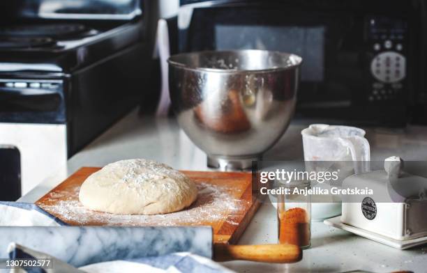 preparing an yeast dough - baking bread stock pictures, royalty-free photos & images