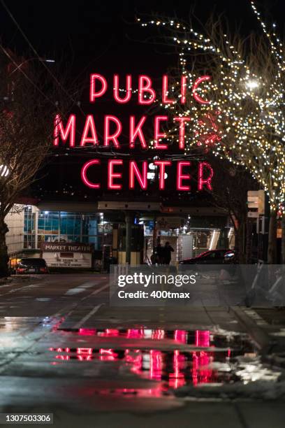 pike place neon - seattle winter stock pictures, royalty-free photos & images