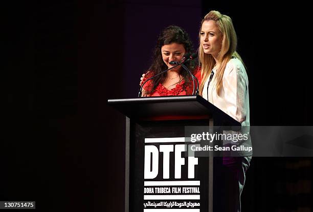 Chief Arab Programmer Hania Mroe and Executive Director of the Doha Film Institute Amanda Palmer speak onstage at Arab Film Competition Awards during...