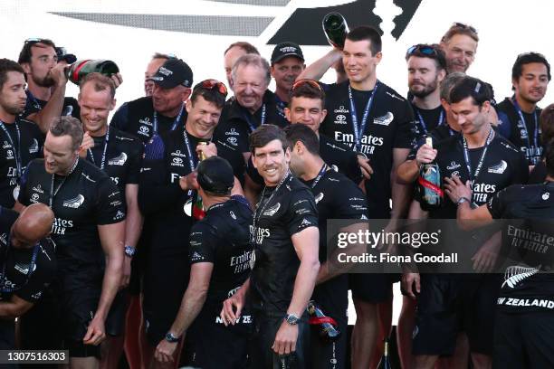 Emirates Team New Zealand's Peter Burling celebrates during the podium presentation after winning race and the American's Cup against Luna Rossa...