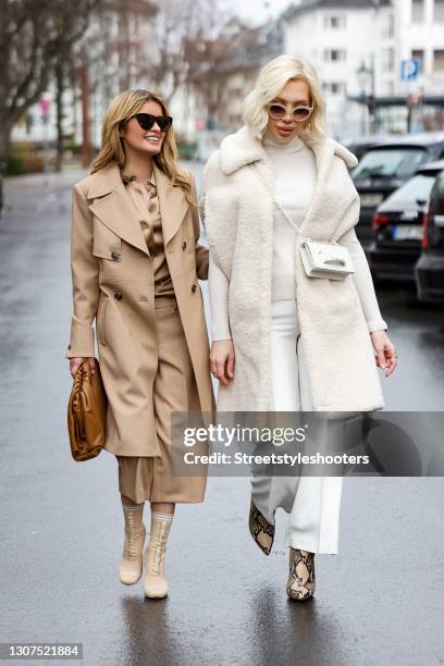 Influencer Gitta Banko wearing beige 7/8 capri pants by Madeleine, a beige silk blouse by Madeleine, a beige coat by Madeleine, beige boots by Fendi,...