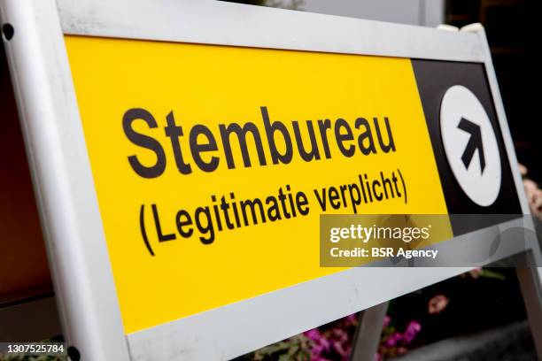 View of a sign indicating the entrance of a polling station at Central Station on March 17, 2021 in Dordrecht, Netherlands during the 2021 Dutch...