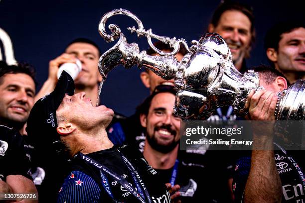 Glenn Ashby of Emirates Team New Zealand celebrates after winning the America's Cup against Luna Rossa Prada Pirelli Team on Auckland Harbour on...