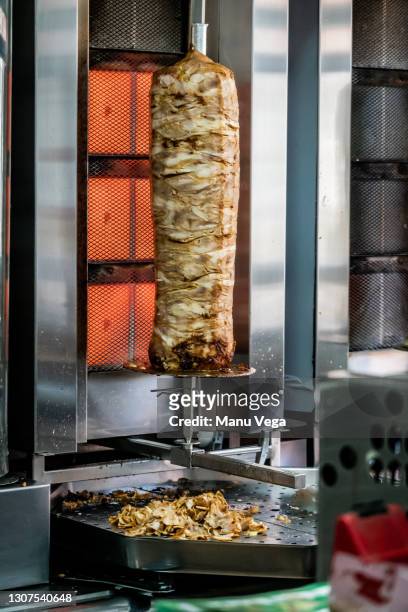 turkish kebap or kebab cooked on a grill. - doner kebab stockfoto's en -beelden