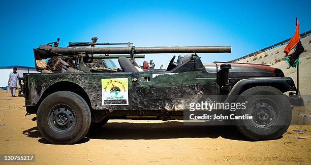 Toyota Land Cruiser gun truck stands fitted with an M40 106mm recoil-less rifle on September 6, 2011 in Misrata, Libya. Fighting in Libya has ceased...