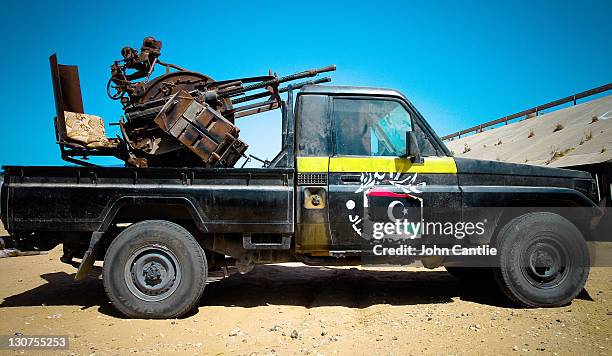 Toyota Land Cruiser gun truck stands fitted with a twin 14.5mm anti-aircraftl gun on September 6, 2011 in Misrata, Libya. Fighting in Libya has...