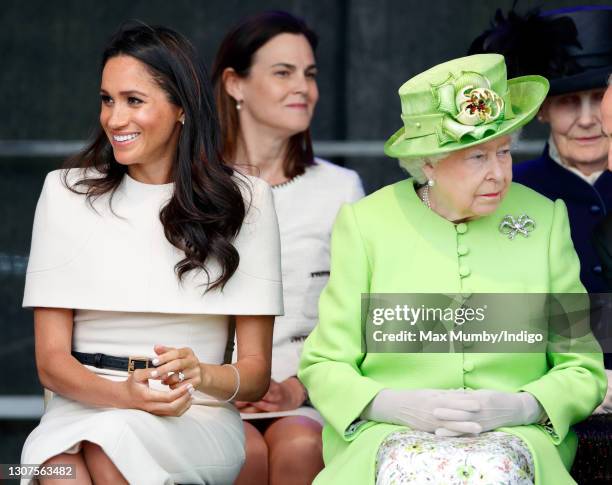 Meghan, Duchess of Sussex and Queen Elizabeth II attend a ceremony to open the new Mersey Gateway Bridge on June 14, 2018 in Widnes, England. Meghan...