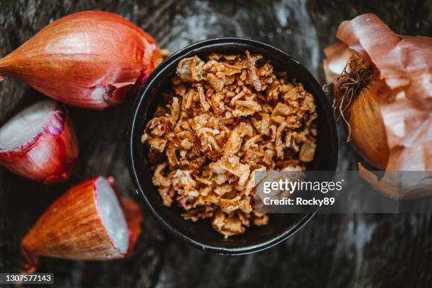 crispy fried onion bits - onion stock pictures, royalty-free photos & images