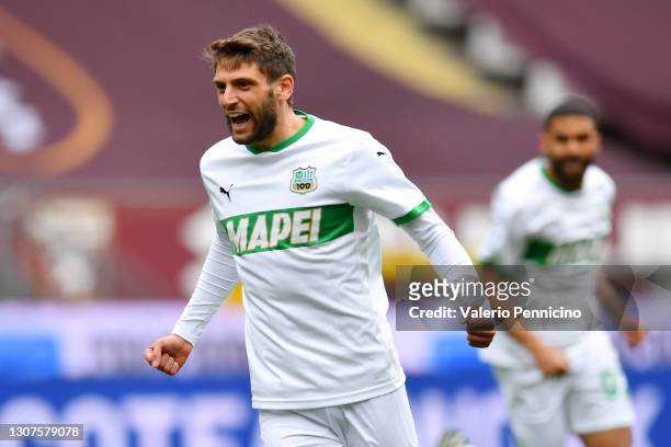 Domenico Berardi of Sassuolo celebrates after scoring his sides first goal during the Serie A match between Torino FC and US Sassuolo at Stadio...