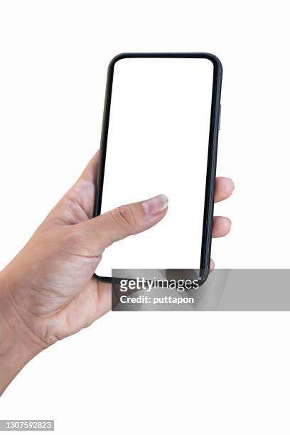 close up of woman hand holding smartphone on white background, cropped hand using smartphone on the background white - woman thumb stock pictures, royalty-free photos & images