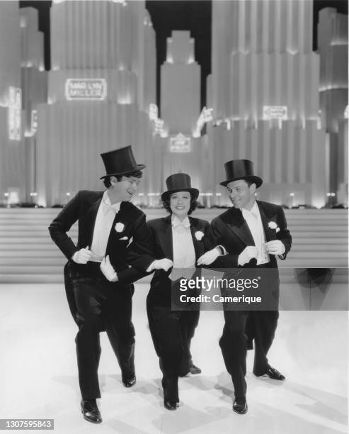 Buddy Ebsen, Eleanor Powell and George Murphy from "Broadway Melody of 1938" is a 1937 American musical film produced by Metro-Goldwyn-Mayer and...
