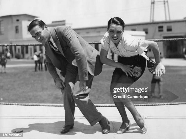 Frank Farnum, originator of the "Charleston", instructs Pauline Starke in the intricacies of the step. Miss Starke is going to be the first actress...