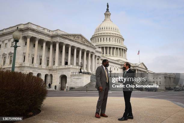 Rep. Burgess Owens and Rep. John Curtis arrive for a news conference about immigration outside the U.S. Capitol on March 17, 2021 in Washington, DC....