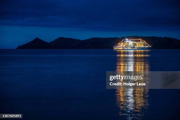 cruise ship mv reef endeavour (captain cook cruises fiji) at anchor at night - fiji cruise stock pictures, royalty-free photos & images