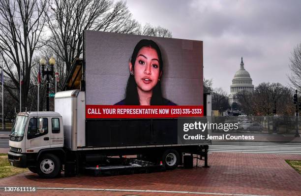 An installation is erected outside of Union Station demanding a Yes vote on the American Dream and Promise Act and the Farm Workforce Modernization...